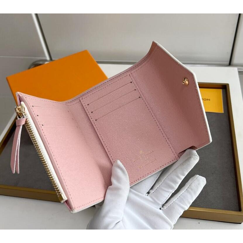 เหรียญผู ้ หญิงดันหัวเข ็ มขัดทองคุณภาพสูงกระเป ๋ าสตางค ์ สั ้ นพับได ้ พร ้ อมกล ่ อง