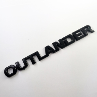 1 x ABS สีดํา OUTLANDER ตัวอักษรโลโก้รถอัตโนมัติด้านหลังสัญลักษณ์ตราสัญลักษณ์สติกเกอร์รูปลอกสําหรับ Mitsubishi