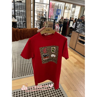 Coach ใหม่ ขายดี เสื้อยืด ผ้าฝ้าย พิมพ์ลาย สําหรับผู้ชาย และผู้หญิง