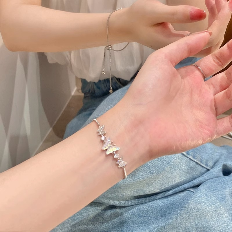 สร้อยข้อมือ ประดับเพชร ไข่มุก ผีเสื้อ สีทอง สีเงิน คุณภาพสูง เหมาะกับฤดูร้อน สไตล์เกาหลี เหมาะกับของขวัญ สําหรับนักเรียนหญิง