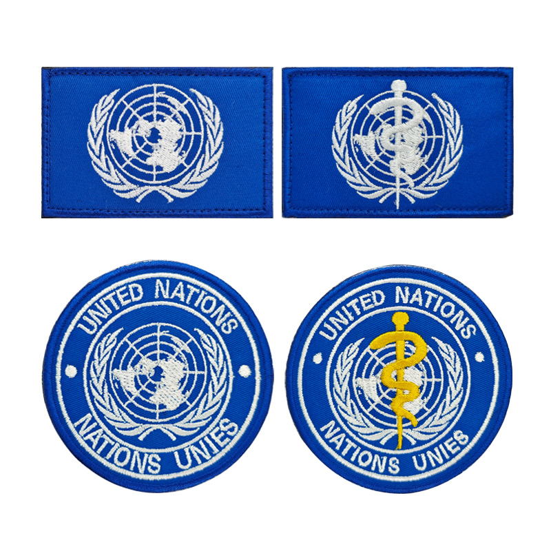 UN United Nations ป้ายปัก Shiwei Organization Patch เหมาะสําหรับเสื้อผ้ากระเป๋าหมวกอุปกรณ์เสริม Hook & Ring Fastener