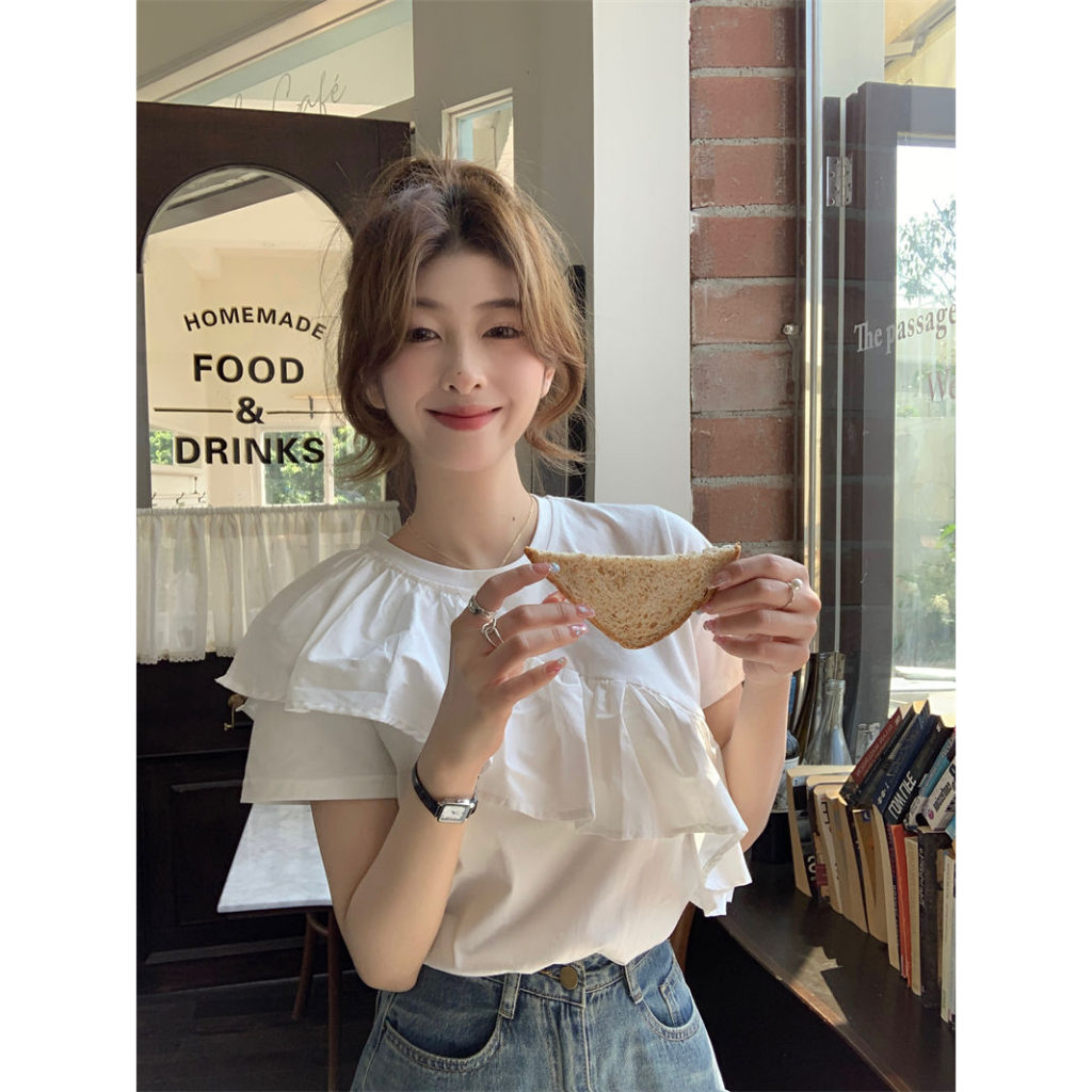ผ้าฝ้ายเกาหลีนัวเนียขอบเย็บปะติดปะต่อกันการออกแบบความรู้สึกเสื้อยืดสําหรับผู้หญิงฤดูร้อนสบายๆธรรมดาแขนสั้นกระพือปีกด้านบน