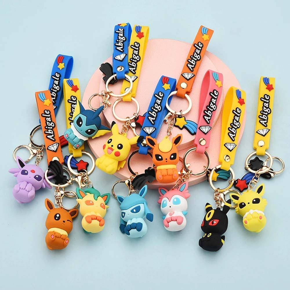 11 พวงกุญแจ โปเกมอน Cute Pikachu Eevee การ์ตูน กระเป๋าเป้สะพายหลัง ตกแต่ง anime figure keychain ของข