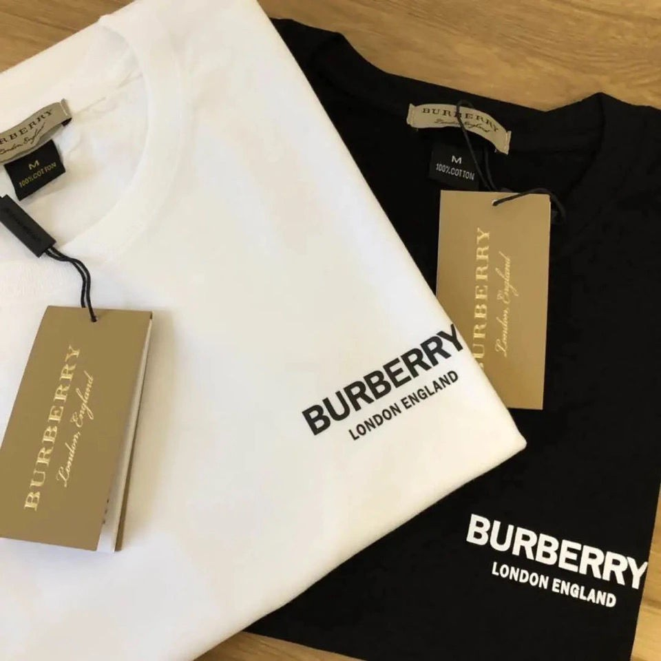 เสื้อยืดแขนสั้นลําลอง คอปก พิมพ์ลายโลโก้ตัวอักษร BUR ขนาดใหญ่ แบบเรียบง่าย แฟชั่นคู่รัก สําหรับผู้ชาย และผู้หญิง