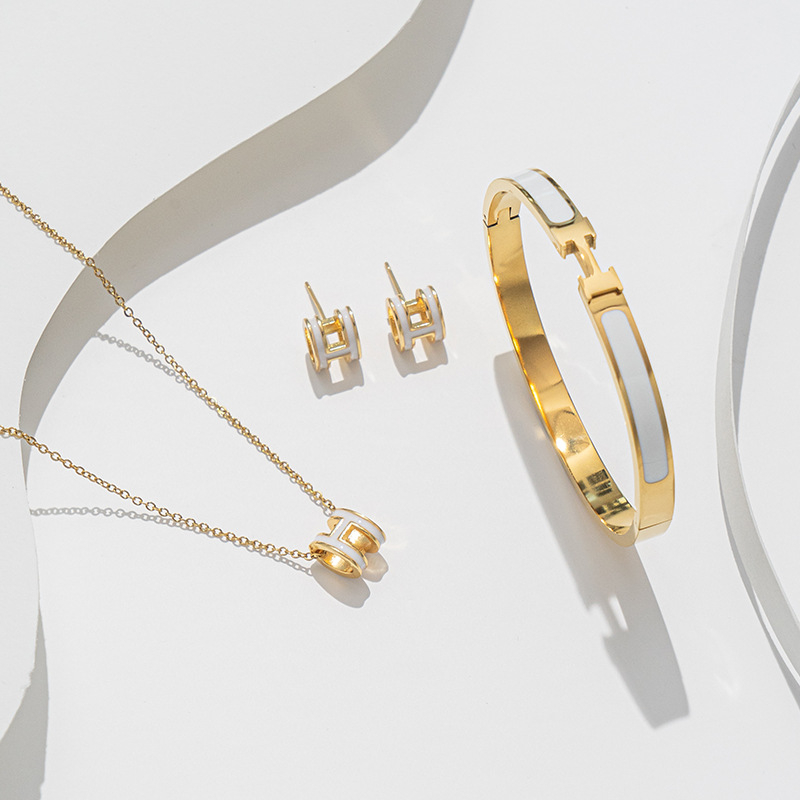 LiLi 18K Gold Titanium H Oil Drop สร้อยคอผู้หญิง Non Fade สแตนเลส H กําไลข้อมือหูเครื่องประดับ