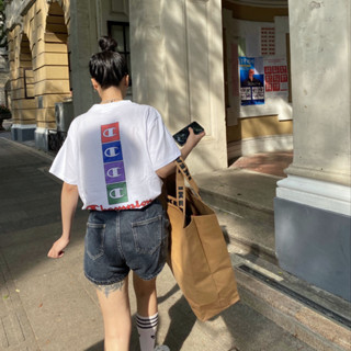 Champion เสื้อยืดแขนสั้นลําลอง ผ้าฝ้ายแท้ พิมพ์ลาย สไตล์สปอร์ต สําหรับผู้ชาย และผู้หญิง