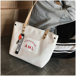 【สินค้าสปอต】กระเป๋าสะพายไหล่ กระเป๋าช้อปปิ้ง ผ้าแคนวาส ขนาดใหญ่ จุของได้เยอะ แบบพกพา แฟชั่นทันสมัย