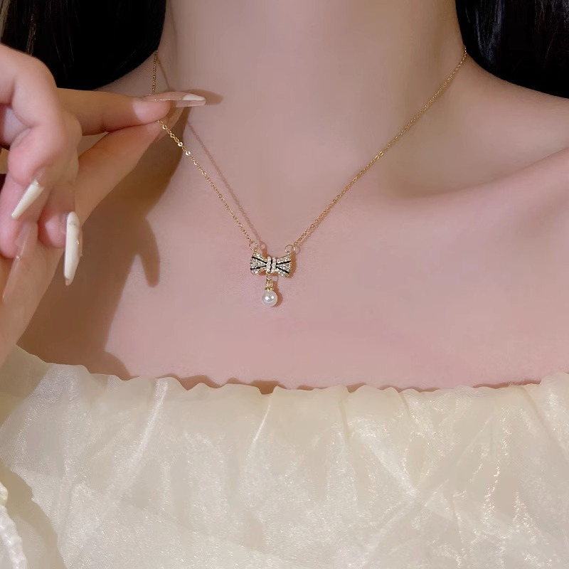 เครื่องประดับ สร้อยคอ ประดับโบว์ และไข่มุก สีทอง คุณภาพสูง เหมาะกับของขวัญวันเกิด สไตล์เกาหลี สําหรับผู้หญิง และนักเรียน - รูปที่ 5