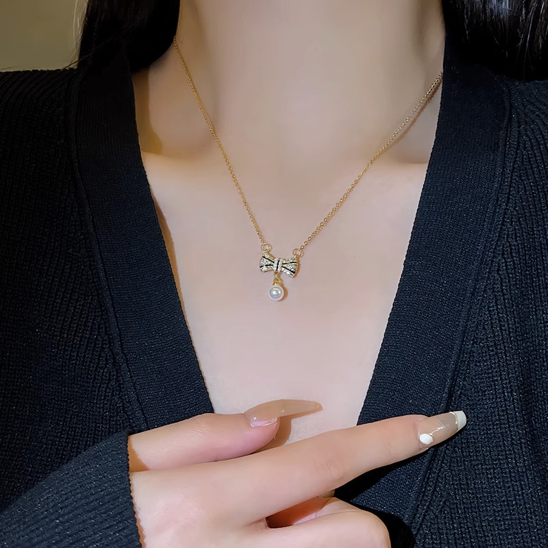 เครื่องประดับ สร้อยคอ ประดับโบว์ และไข่มุก สีทอง คุณภาพสูง เหมาะกับของขวัญวันเกิด สไตล์เกาหลี สําหรับผู้หญิง และนักเรียน - รูปที่ 4