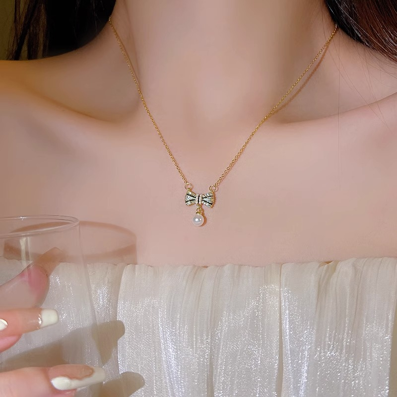 เครื่องประดับ สร้อยคอ ประดับโบว์ และไข่มุก สีทอง คุณภาพสูง เหมาะกับของขวัญวันเกิด สไตล์เกาหลี สําหรับผู้หญิง และนักเรียน - รูปที่ 6