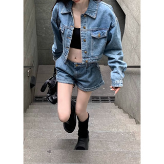 Two piece set of denim jacket and high waisted slim shorts