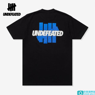 Undefeated เสื้อยืดคอกลม แขนสั้น ผ้าฝ้ายแท้ พิมพ์ลายโลโก้ สําหรับผู้ชาย และผู้หญิง