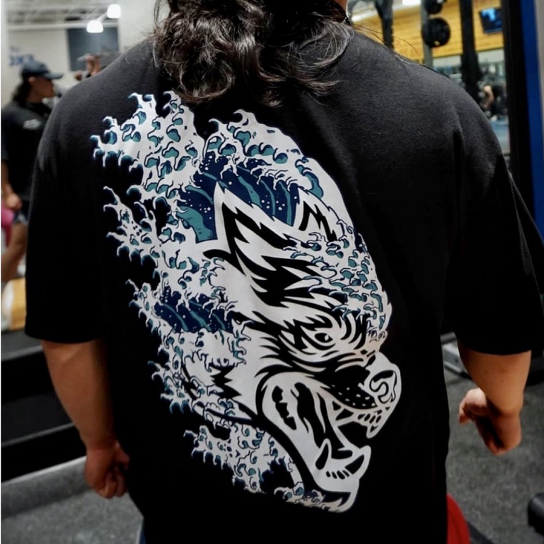 เสื้อยืดแขนสั้นลําลอง ผ้าฝ้าย ทรงหลวม พิมพ์ลายหัวหมาป่า สไตล์อเมริกัน สําหรับผู้ชาย และผู้หญิง