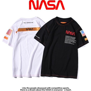 เสื้อยืดแขนสั้น คอกลม ผ้าฝ้าย ปักลายริบบิ้น NASA แฟชั่นสําหรับผู้ชาย และผู้หญิง