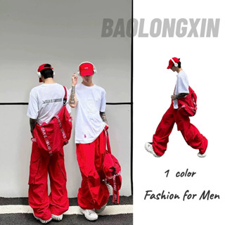 BAOLONGXIN ผู้ชายหลวมโดพามีนสวมใส่สีแดงอเมริกันย้อนยุคกางเกงถนนอย่างรวดเร็วแห้งกางเกงก