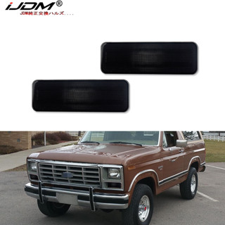 Ijdm ฝาครอบไฟเลี้ยวกันชนหน้ารถยนต์ แบบเปลี่ยน สําหรับ 1980-1986 Ford F150 F250 F350 Bronco OEM E1TZ13200A FO 2 ชิ้น2520101ไม่มีหลอดไฟ / ซ็อกเก็ต