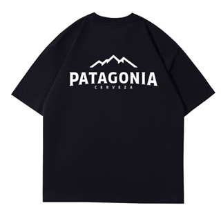 เสื้อยืดแขนสั้น ผ้าฝ้ายแท้ พิมพ์ลายการ์ตูนโลโก้ Patagoniat แฟชั่นคู่รัก สไตล์คลาสสิก สําหรับผู้ชาย และผู้หญิง