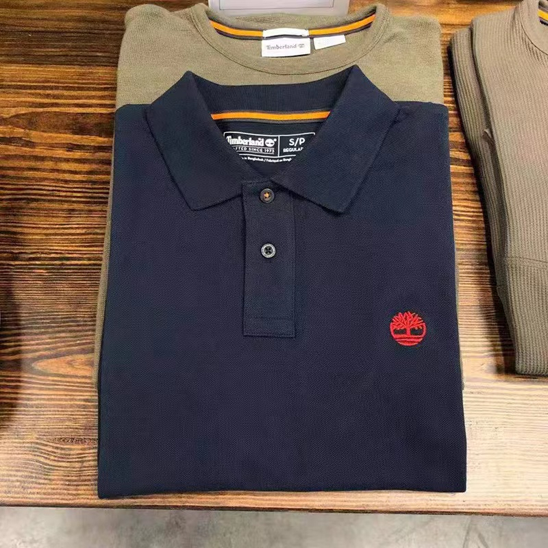 Timberl ใหม่ เสื้อโปโล แขนสั้น ผ้าฝ้ายแท้ พิมพ์ลาย สําหรับผู้ชาย และผู้หญิง