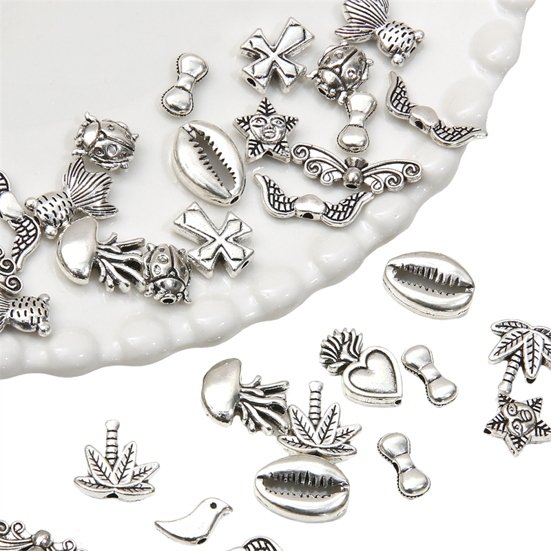 จี้ลูกปัดโลหะสังกะสี รูปผีเสื้อ ดาว ดอกไม้ สําหรับทําเครื่องประดับ ต่างหู สร้อยข้อมือ DIY