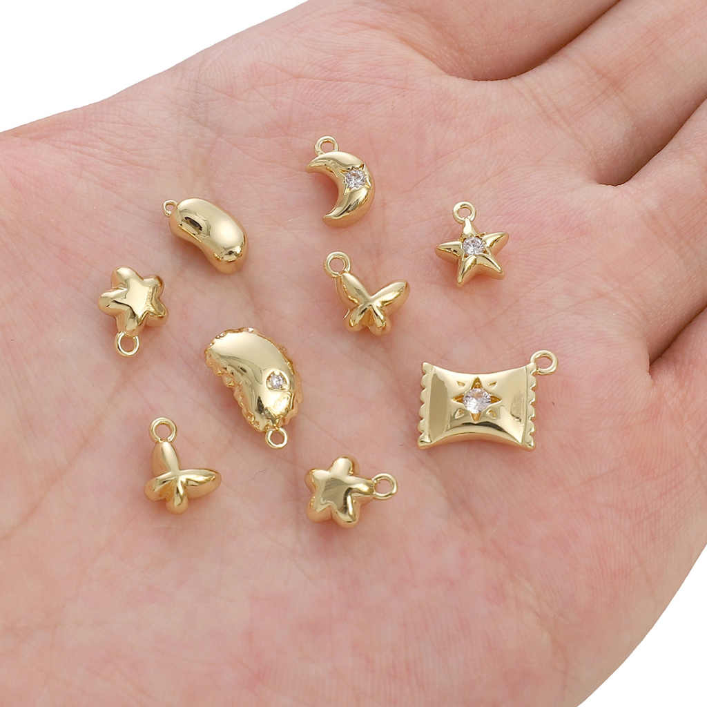 1 ชิ้นจี้ลูกอมถั่วดอกไม้จี้ Star Moon จี้ผีเสื้อจี้ 14 K Gold-Plated เครื่องประดับจี้ DIY แฟชั่นเครื่องประดับอุปกรณ์เสริม