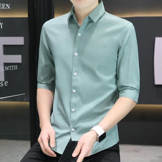 MANSTR เสื้อเชิ้ตผู้ชาย คุณภาพ ลำลอง 3 4 แขน ผ้าไหมน้ำแข็ง เสื้อเชิ้ตเกาหลี สีทึบ เข้ารูป ชุดทำงานอย่างเป็นทางการ สีเขียว\ น้ำเงิน \ ดำ \ ขาว