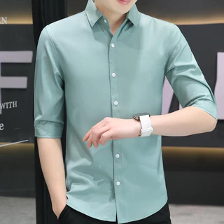MANSTR เสื้อเชิ้ตผู้ชาย คุณภาพ ลำลอง 3 4 แขน ผ้าไหมน้ำแข็ง เสื้อเชิ้ตเกาหลี สีทึบ เข้ารูป ชุดทำงานอย่างเป็นทางการ สีเขียว\ น้ำเงิน \ ดำ \ ขาว
