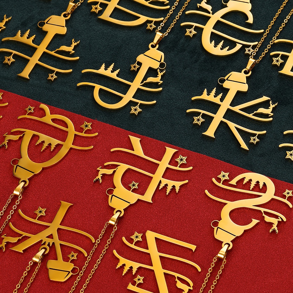 Kaijiang Kalung Surat Krismas สร้อยคอโซ่สเตนเลส จี้ตัวอักษร สีทอง สร้างสรรค์ เครื่องประดับแฟชั่น สําหรับผู้หญิง ผู้ชาย