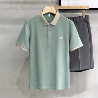 เสื้อโปโลแขนสั้นลําลอง เนื้อผ้าฝ้าย ปักลาย ทรงหลวม ระบายอากาศ สไตล์นักธุรกิจ สําหรับผู้ชาย มี 5 สี