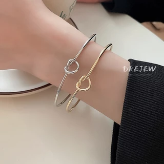 DREJEW สร้อยข้อมือโลหะ ผูกปม ความรัก สไตล์ยุโรป และอเมริกา การออกแบบเฉพาะ เกาหลี ins สร้อยข้อมืออเนกประสงค์ ที่เรียบง่าย แพ้ง่าย