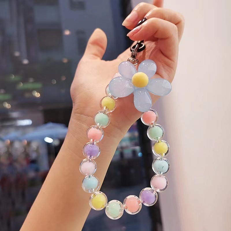 สายคล้องโทรศัพท์มือถือ แบบสั้น ประดับลูกปัด สีมาการอง หลากสีสัน ถอดออกได้ สไตล์เกาหลี ญี่ปุ่น สําหรับห้อยโทรศัพท์มือถือ สายคล้องโทรศัพท์มือถือ ประดับลูกปัด ลายดอกไม้