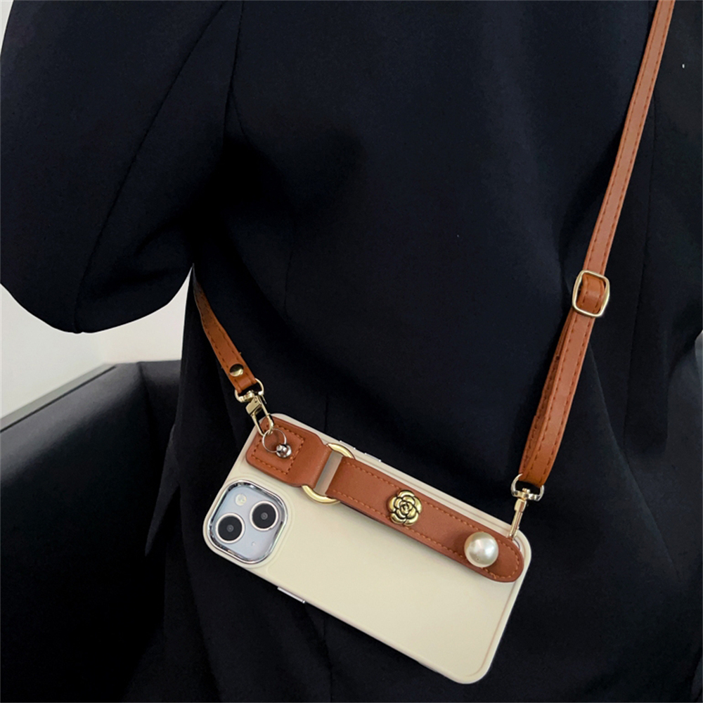 เคสโทรศัพท์มือถือหนังนิ่ม กันกระแทก ลายดอกคามิเลีย 3D พร้อมสายคล้องมือ ประดับไข่มุก สําหรับ iPhone 15 14 Pro Max 12 13 11