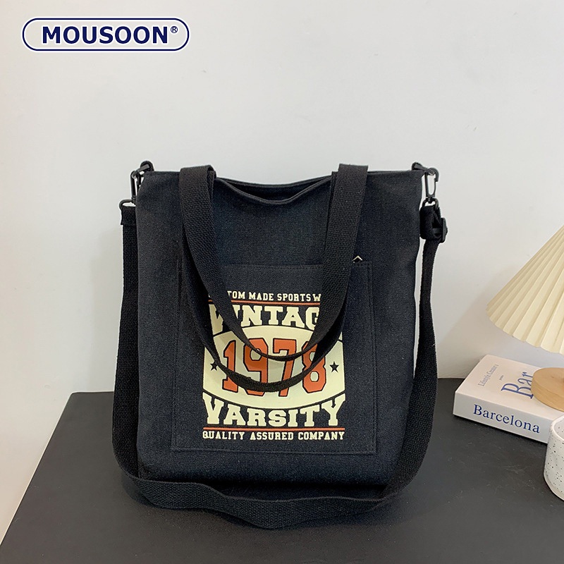 Mousoon กระเป๋าโท้ทสําหรับผู้ชายและผู้หญิงสไตล์เดียวกันความจุขนาดใหญ่นักเรียน Retro Class ผ้าใบหนา Soled กระเป๋าสะพาย Messenger