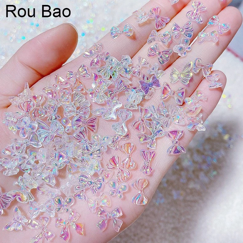 Rou Bao โบว์เรซิ่น รูปผีเสื้อ 3D ขนาดเล็ก สําหรับตกแต่งเล็บ DIY 50 ชิ้น