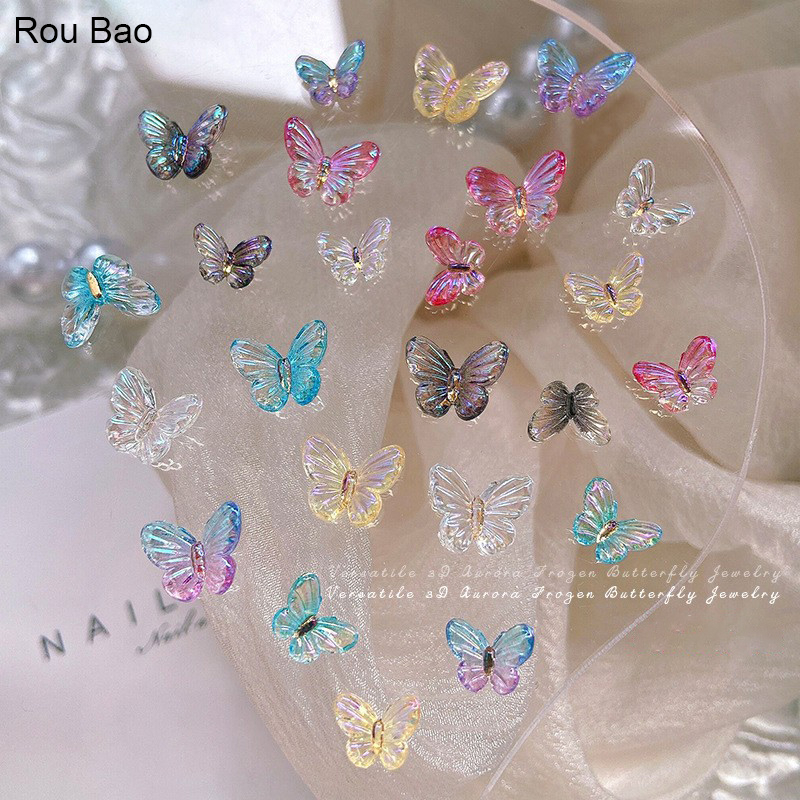 Rou Bao อุปกรณ์ตกแต่งเล็บเรซิ่น ไล่โทนสี รูปผีเสื้อ 3D ขนาดเล็ก หลากสี สําหรับตกแต่งเล็บ DIY 50 ชิ้น