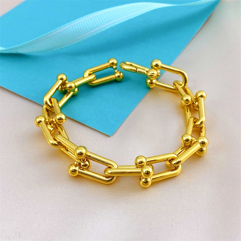 แฟชั่นหรูหราสร้อยข้อมือหัวเข็มขัดเกือกม้าหญิง High-End U-Shaped Interlocking เพชร-Studded คู่ Bamb