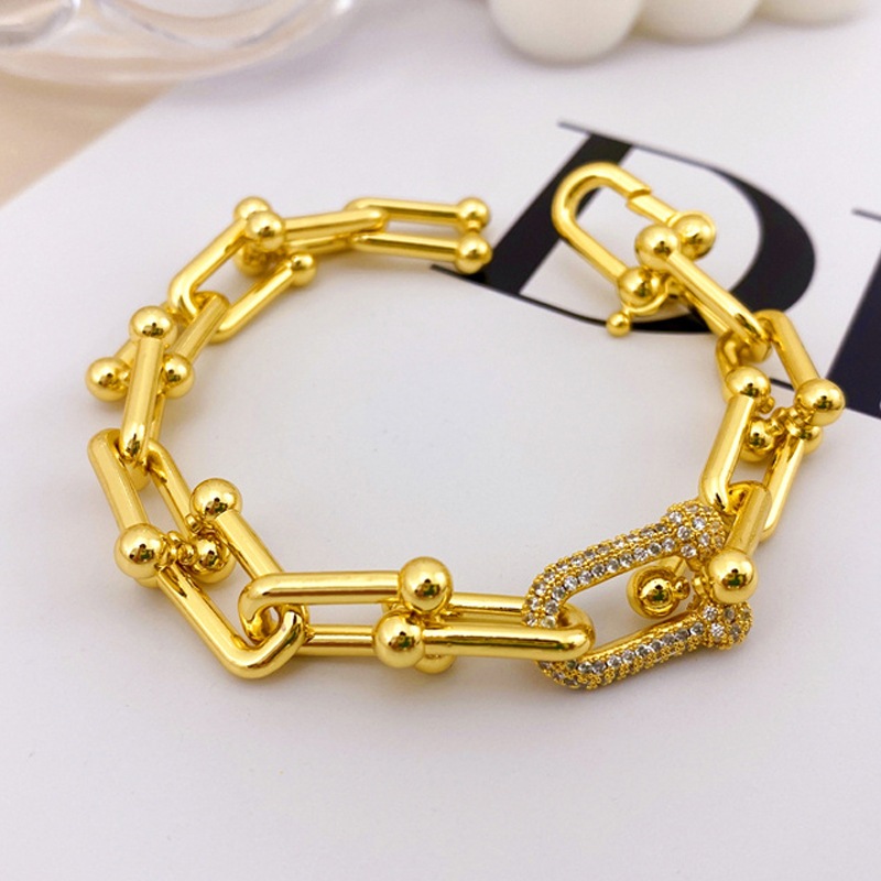 แฟชั่นหรูหราสร้อยข้อมือหัวเข็มขัดเกือกม้าหญิง High-End U-Shaped Interlocking เพชร-Studded คู่ Bamb