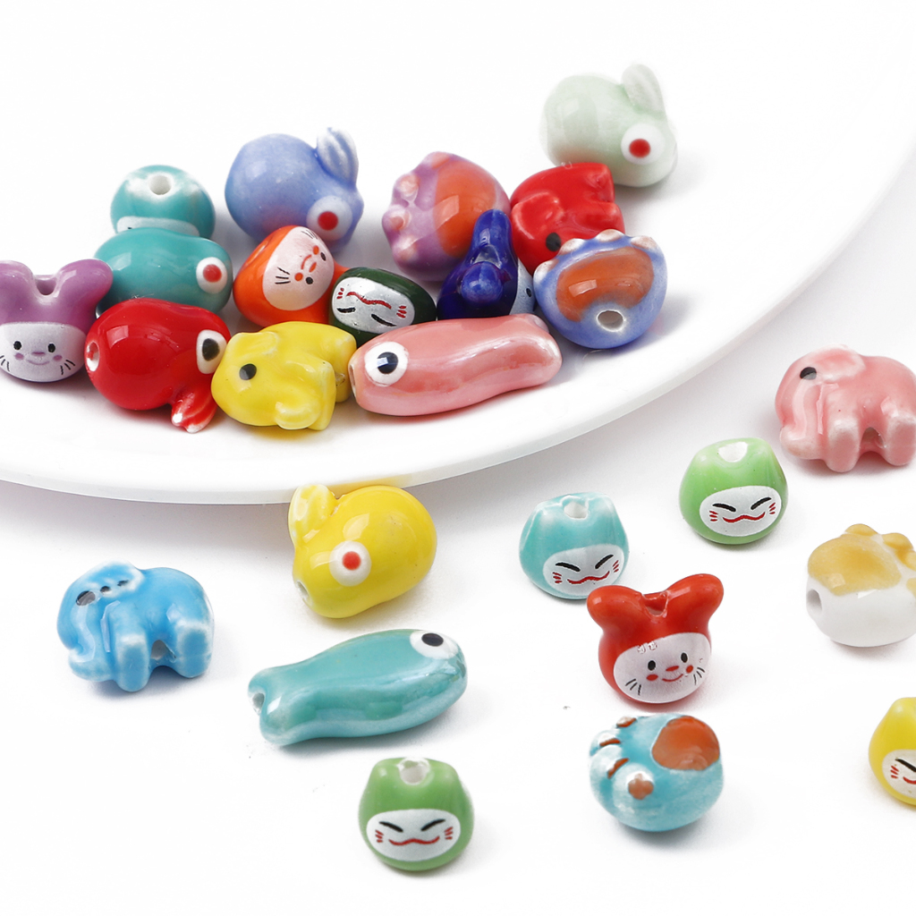 ลูกปัดเซรามิกสัตว์น่ารัก 10 ชิ้น สีสันสวยงาม สำหรับทำสร้อยข้อมือและพวงกุญแจ
