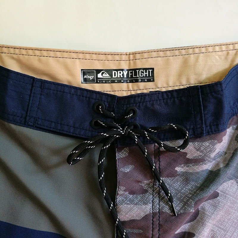 Loose Board Shorts Quick-drying Beach Shorts กางเกงขาสั้นผู้ชาย 2 กระเป๋า A30108 ราคา ถูกที่สุด ดีลบีเคเค แกลเลอรีภาพที่ 4