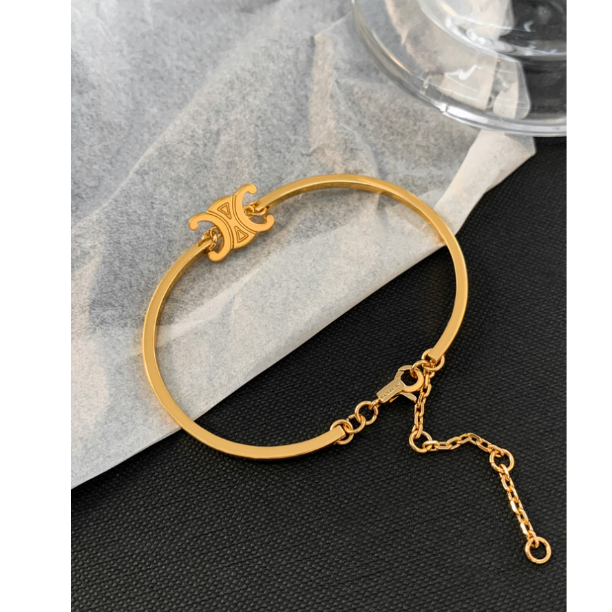 สร้อยข้อมือเหล็กไทเทเนียม ชุบทอง 18K หรูหรา สําหรับผู้หญิง