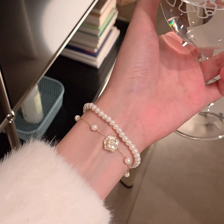 สร้อยข้อมือ ประดับไข่มุก รูปดอกคามิเลีย เหมาะกับของขวัญวันเกิด สําหรับนักเรียนหญิง