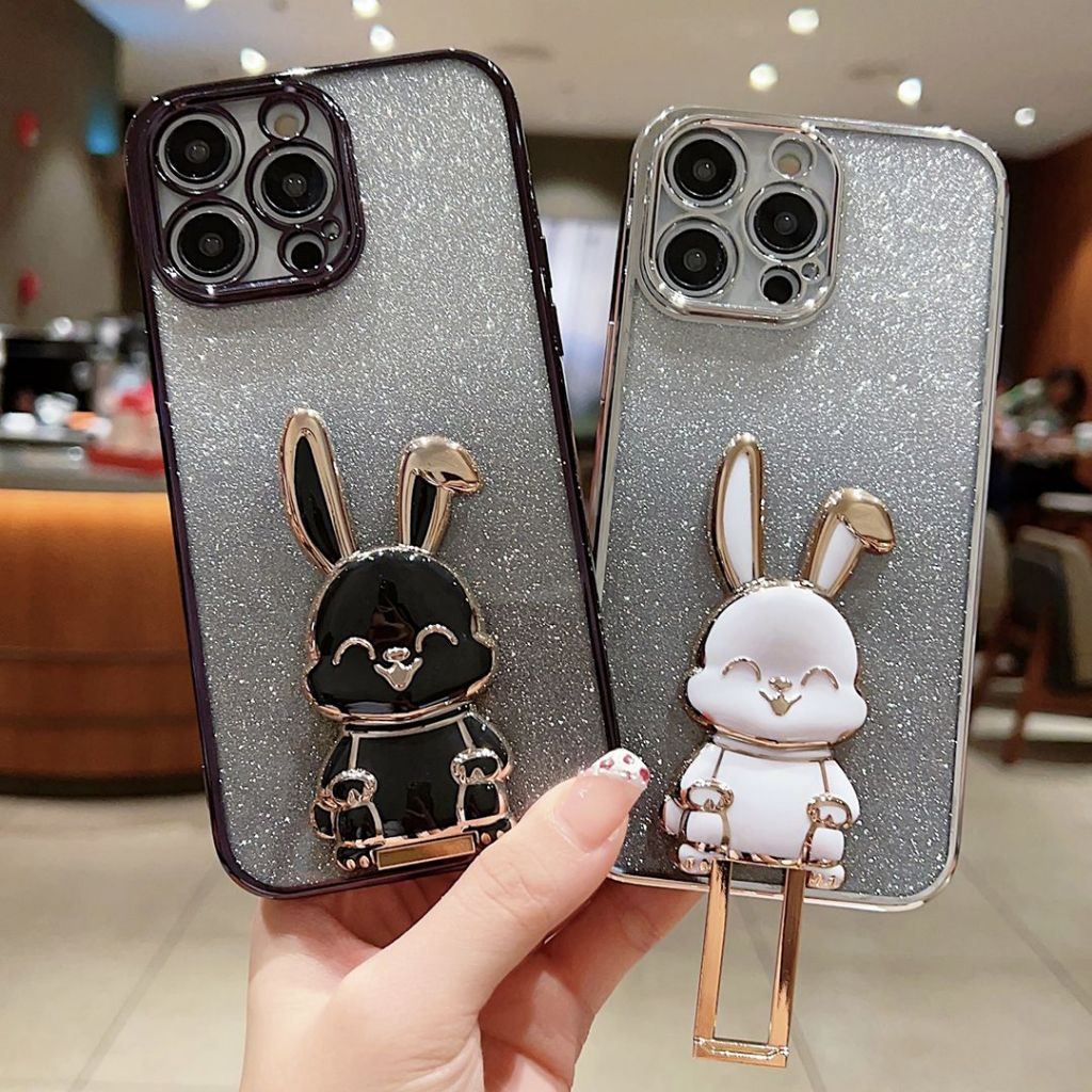 เคสโทรศัพท์ iPhone 11 11 Pro 11 Pro Max 12 12 Pro 12 Pro Max 13 13 Pro 13 Pro Max 14 14 Plus 14 Pro 14 Pro Max 7 Plus 8 Plus Xs XR Xs Max เคสโทรศัพท์ใสเคสโทรศัพท์แวววาวพร้อมขาตั้งกระต่ายน่ารัก