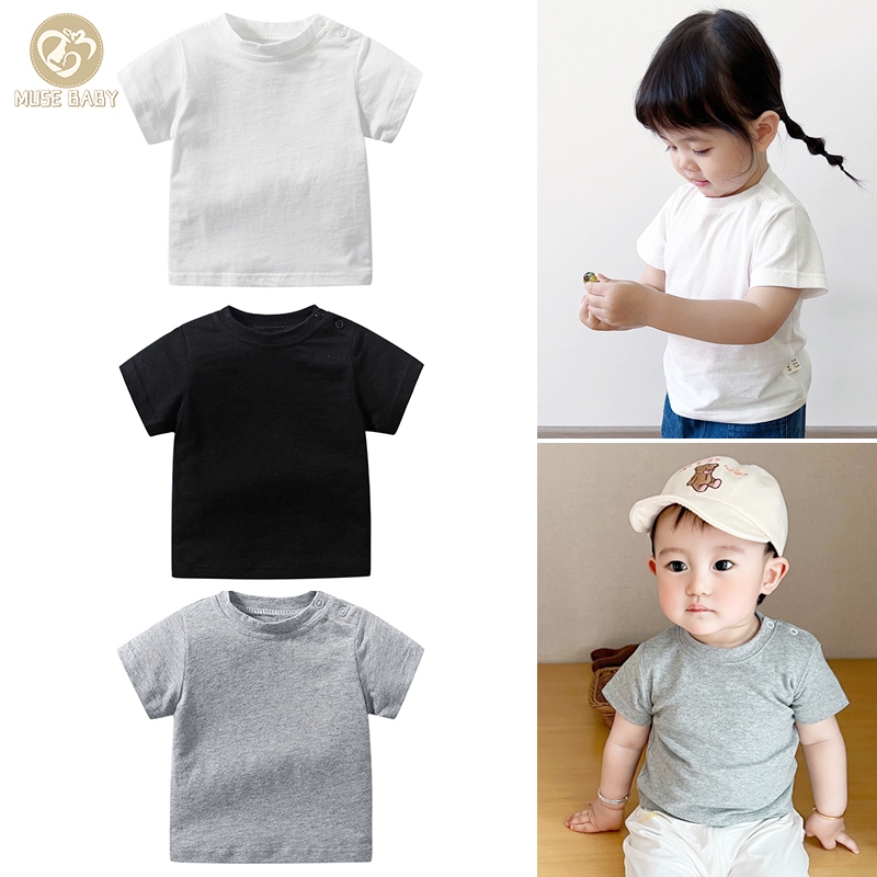 เสื้อยืดแขนสั้น ผ้าฝ้าย แบบนิ่ม สีพื้น สําหรับเด็กผู้ชาย และเด็กผู้หญิง อายุ 3-24 เดือน