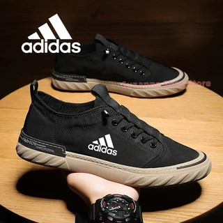 พร้อมสต็อก สไตล์สีเทาผู้ชายรองเท้าผ้าใบรองเท้าลําลองแบนรองเท้ากีฬารองเท้าวิ่ง