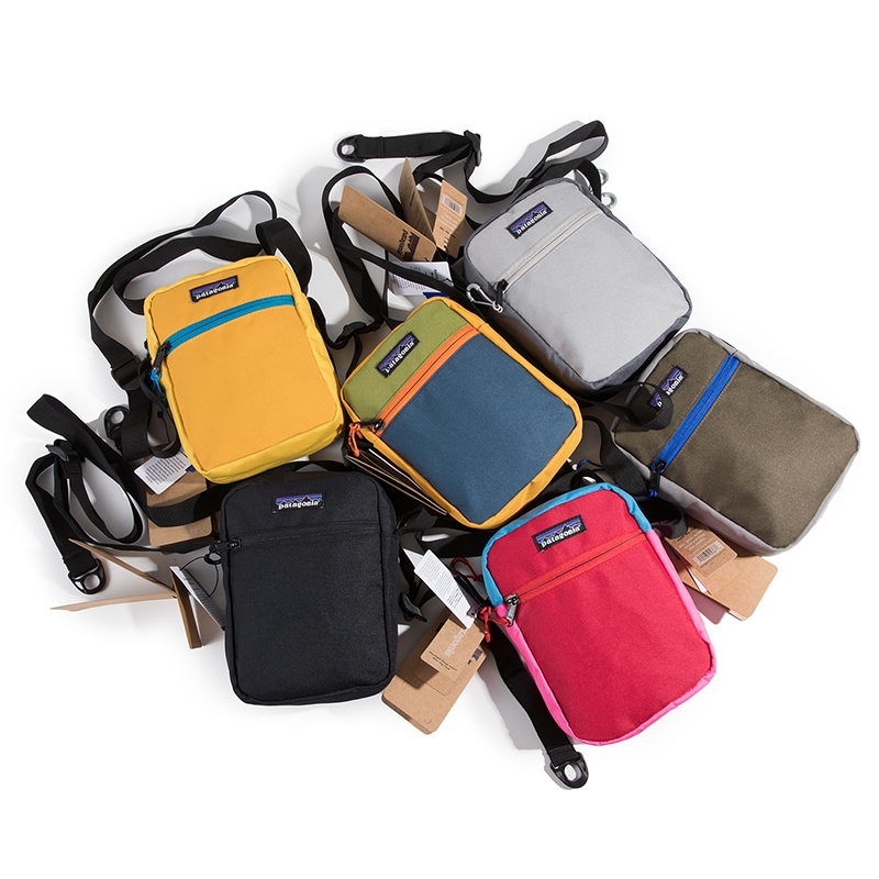 Patagonia กระเป๋าสะพายไหล่ลําลอง ผ้าแคนวาส ทรงสี่เหลี่ยม ขนาดเล็ก ใส่โทรศัพท์มือถือได้ เหมาะกับการพกพาเล่นกีฬา