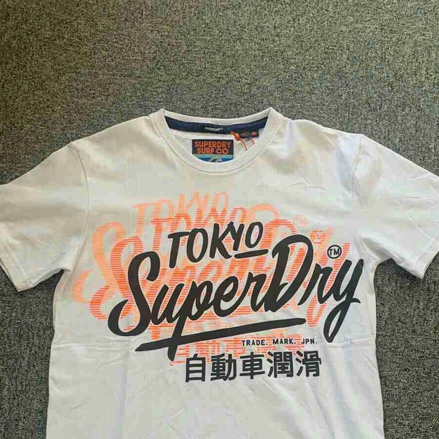 Superdry Superdry Extreme Dry เสื้อยืดผู้ชายคอกลมแขนสั้น Casual พิมพ์โลโก้ฤดูใบไม้ผลิฤดูร้อน Top Street Wear
