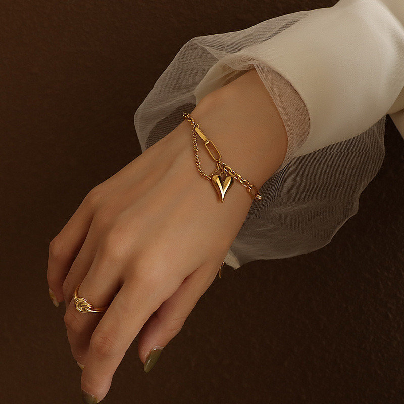 สร้อยข้อมือสแตนเลส จี้รูปหัวใจ สไตล์เรโทร