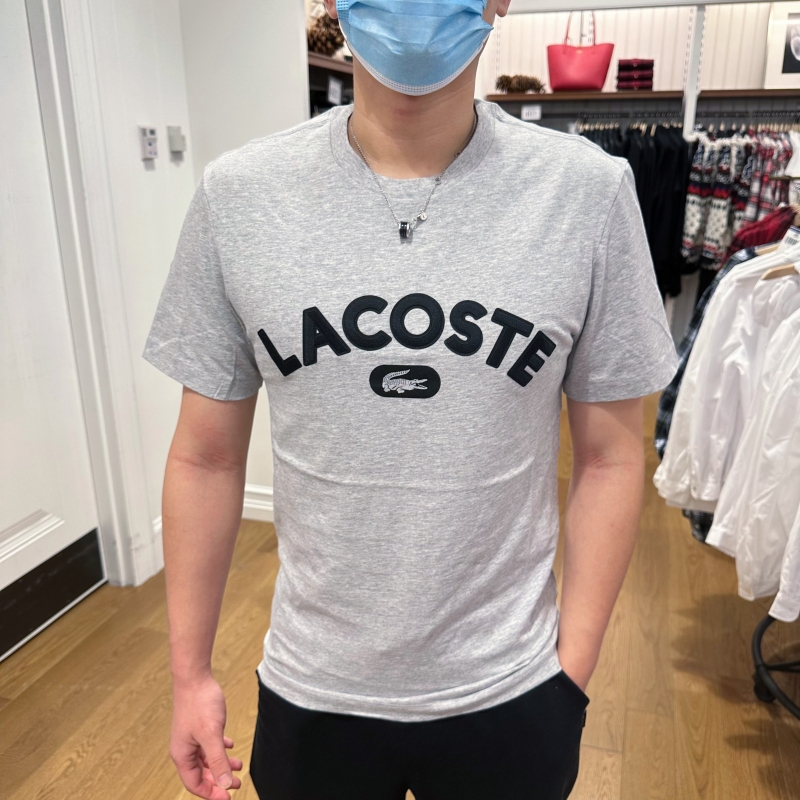 LACOSTE ลาคอสท์ ผู้ชายตัวอักษรที่เรียบง่ายและหลากหลาย แห่กัน โลโก้ผ้าฝ้ายแท้คอกลมแขนสั้นเสื้อยืด