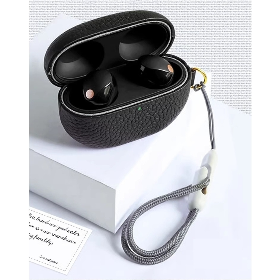 เคสหูฟังหนังแท้ ลายลิ้นจี่ พร้อมหัวเข็มขัด สําหรับ Sony WF-1000XM5