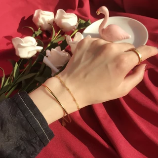 สร้อยข้อมือ เหล็กไทเทเนียม ชุบทอง 18k ทรงกลม ปิดได้ สําหรับคู่รัก