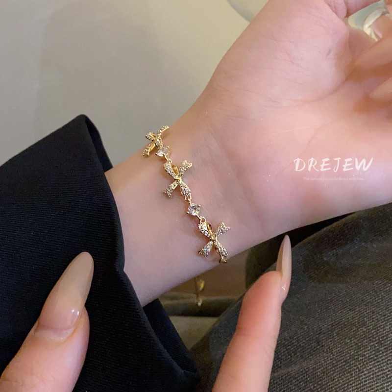 DREJEW สร้อยข้อมือ ประดับโบว์ เพทาย ทอง 18K แฟชั่นเกาหลี มุก ดึงออก หรูหรา และอเนกประสงค์ เครื่องประดับมือ